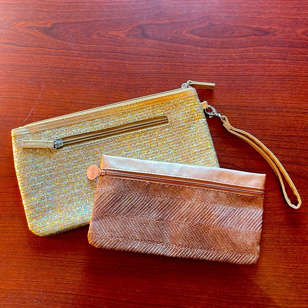 Wristlet and make up bag bundle. Like new no tags